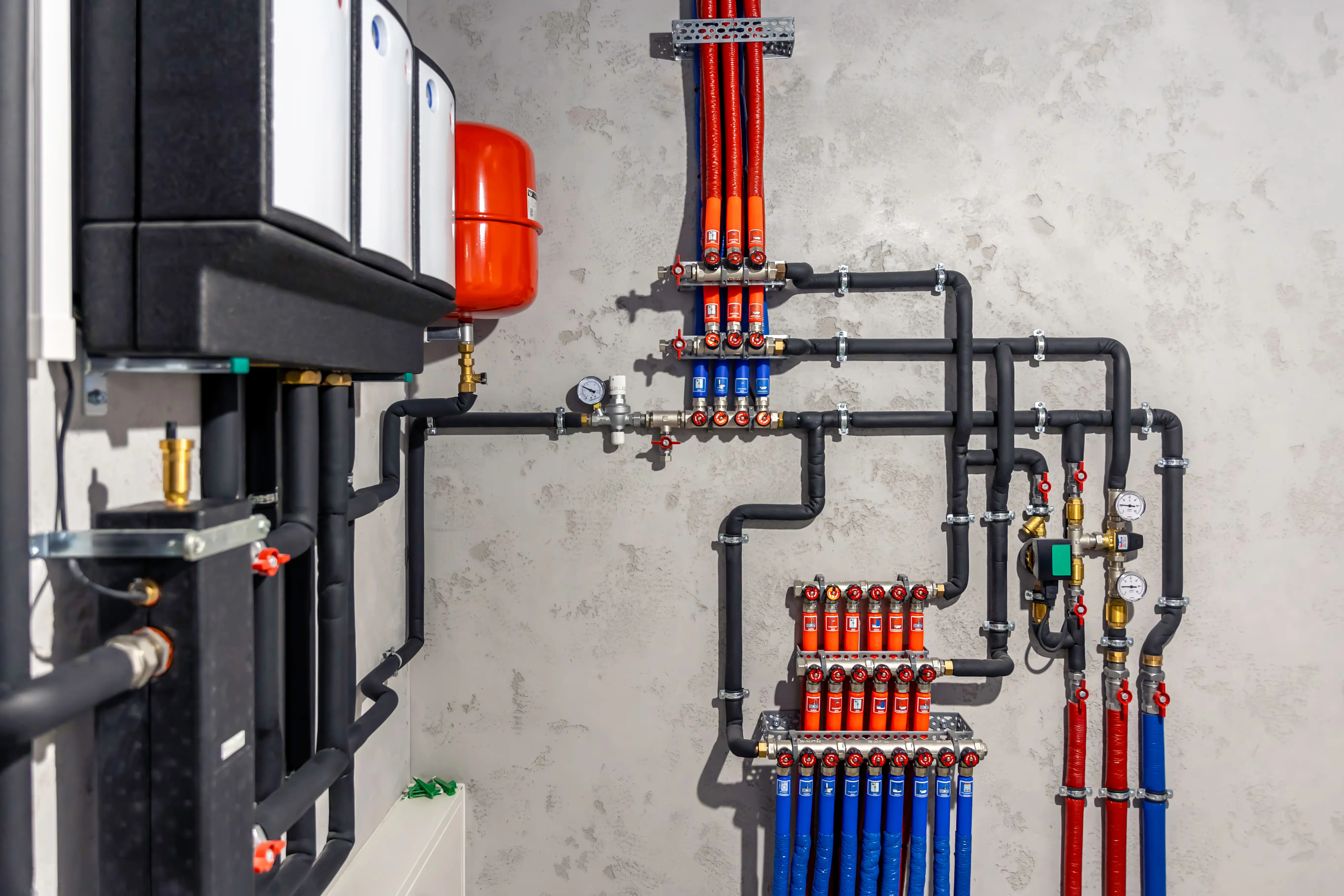 Modern autonomous boiler room with manifolds and control panel