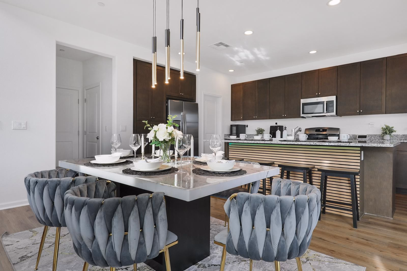 Premium kitchen and dining area requiring deep cleaning after festival events - spaces like these across 30 properties need coordinated teams for post-event restoration that SixThree8 manages through real-time GPS tracking